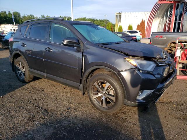 Photo 4 from auction – 2017 TOYOTA RAV4 XLE with VIN JTMRFREV8HD219047