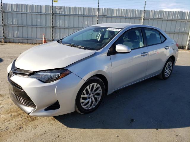 TOYOTA COROLLA L 2019 with VIN 2T1BURHE3KC230996 - Photo from auction
