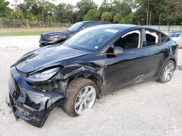 TESLA MODEL Y 2021 with VIN 5YJYGDED6MF107305 - Photo from auction