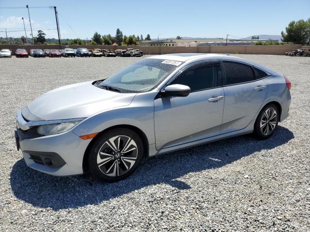 HONDA CIVIC EX 2017 with VIN 2HGFC1F35HH640898 - Photo from auction