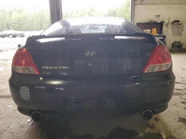 Photo 6 from auction – 2005 HYUNDAI TIBURON with VIN KMHHM65D55U161476