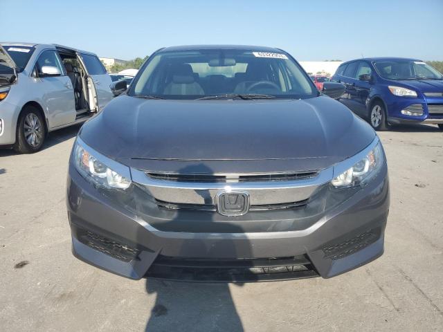 Photo 5 from auction – 2018 HONDA CIVIC LX with VIN 19XFC2F55JE035917