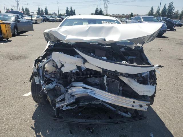 Photo 5 from auction – 2022 TOYOTA COROLLA LE with VIN JTDEPMAE9N3014505