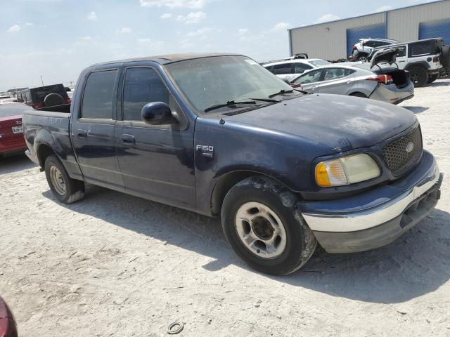 Photo 4 from auction – 2003 FORD F150 SUPER with VIN 1FTRW07693KD57430