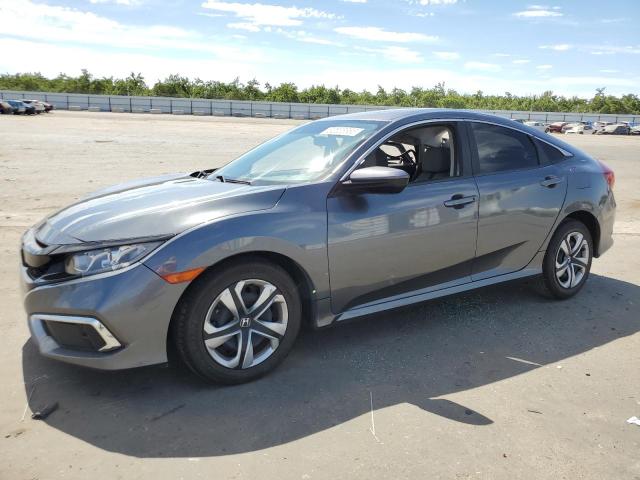 HONDA CIVIC LX 2020 with VIN 19XFC2F67LE204752 - Photo from auction