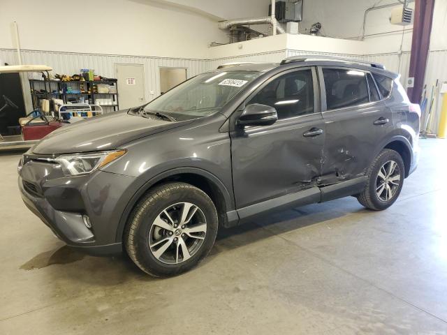 TOYOTA RAV4 XLE 2017 with VIN JTMWFREV5HJ706906 - Photo from auction