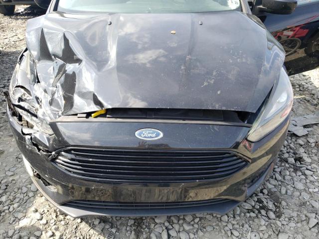 Photo 11 from auction – 2018 FORD FOCUS SE with VIN 1FADP3F22JL225937