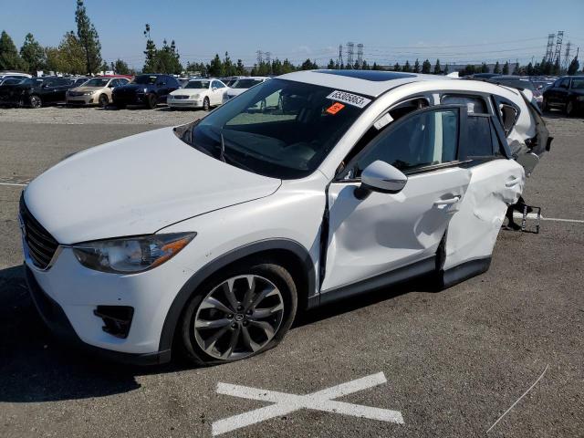 MAZDA CX-5 GT 2016 with VIN JM3KE2DY7G0820504 - Photo from auction