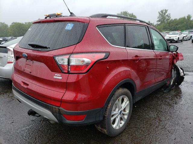 Photo 3 from auction – 2018 FORD ESCAPE SEL with VIN 1FMCU0HD1JUC29477