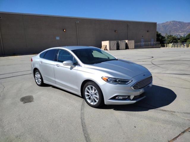FORD FUSION TIT 2018 with VIN 3FA6P0SU0JR110348 - Photo from auction