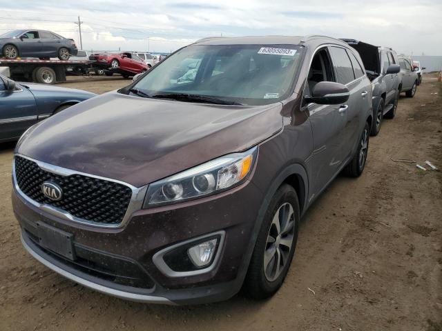 KIA SORENTO EX 2016 with VIN 5XYPHDA17GG033412 - Photo from auction