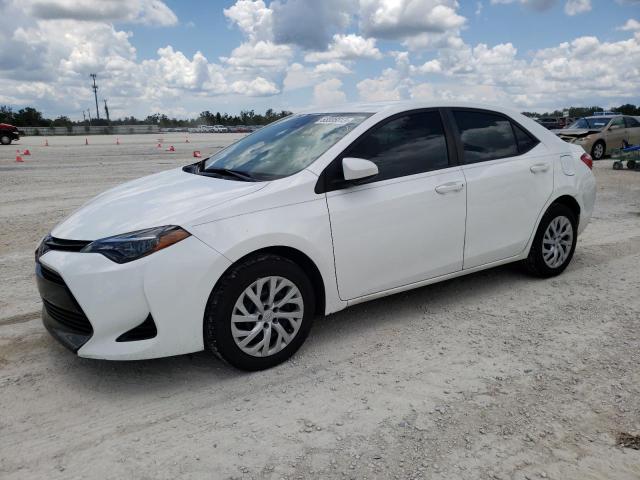 TOYOTA COROLLA L 2018 with VIN 5YFBURHE7JP851978 - Photo from auction