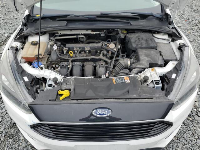 Photo 11 from auction – 2016 FORD FOCUS SE with VIN 1FADP3K2XGL327291
