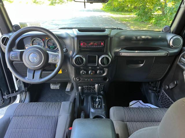 Photo 9 from auction – 2012 JEEP WRANGLER U with VIN 1C4BJWDGXCL205845