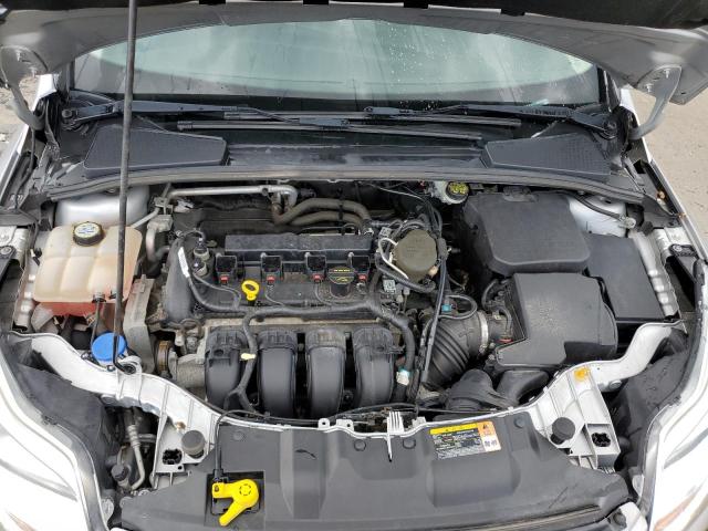 Photo 11 from auction – 2013 FORD FOCUS SE with VIN 1FADP3F24DL359014