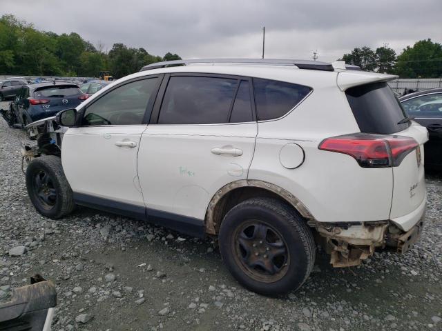 Photo 2 from auction – 2017 TOYOTA RAV4 LE with VIN JTMZFREV2HJ715494