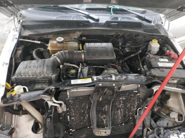 Photo 12 from auction – 2003 JEEP LIBERTY RE with VIN 1J8GL38K33W604262