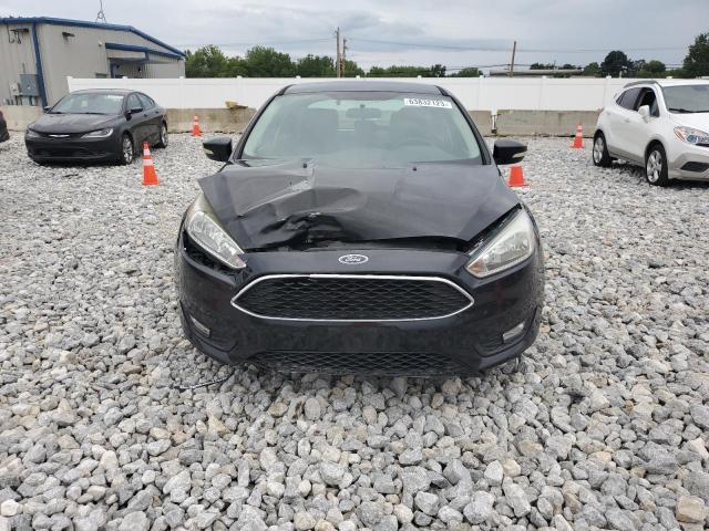 Photo 5 from auction – 2015 FORD FOCUS SE with VIN 1FADP3F20FL355626