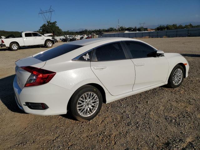 Photo 3 from auction – 2019 HONDA CIVIC LX with VIN 2HGFC2E60KH565780