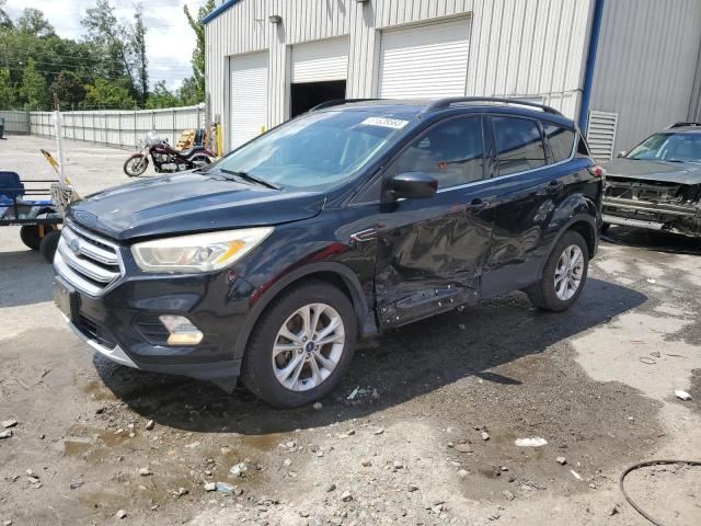 FORD ESCAPE SE 2017 with VIN 1FMCU0G90HUE63522 - Photo from auction