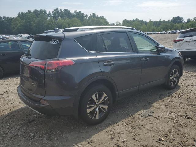 Photo 3 from auction – 2017 TOYOTA RAV4 XLE with VIN JTMRFREV3HJ715472
