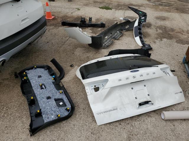 Photo 13 from auction – 2020 FORD ESCAPE TIT with VIN 1FMCU9J95LUC54685