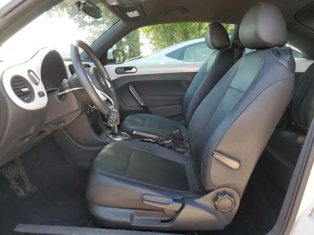 Photo 7 from auction – 2013 VOLKSWAGEN BEETLE with VIN 3VWJX7AT9DM632688