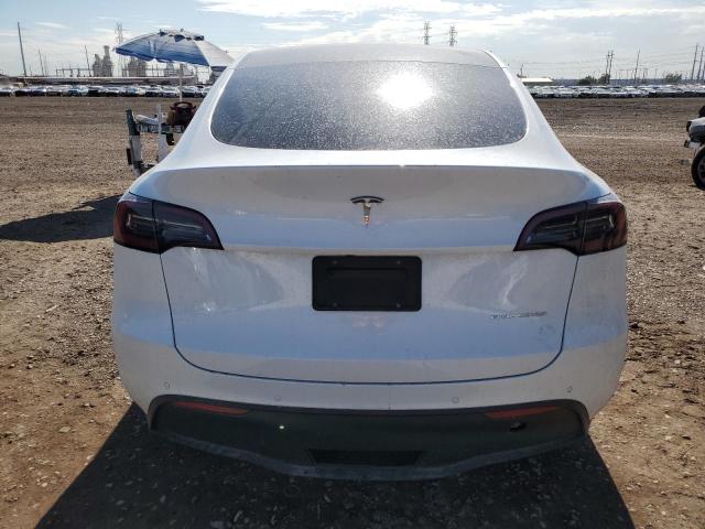 Снимка 6 от търг – 2023 TESLA MODEL Y с VIN 7SAYGAEE8PF591895