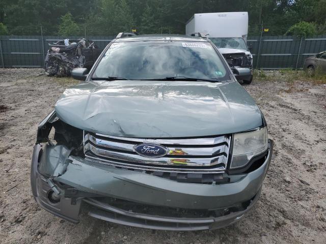 Photo 5 from auction – 2008 FORD TAURUS X S with VIN 1FMDK05W38GA08911