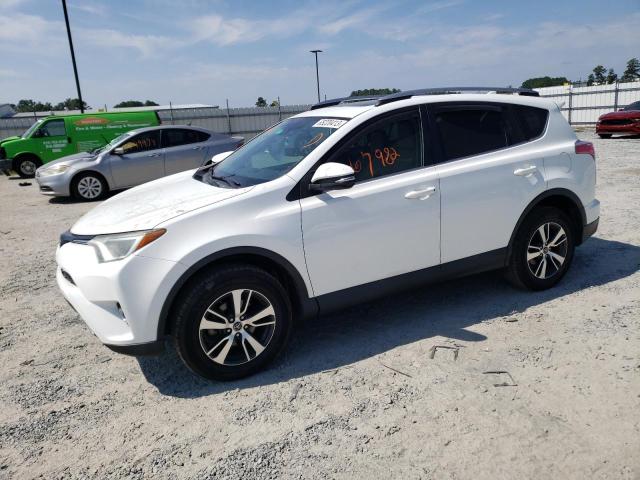 TOYOTA RAV4 XLE 2017 with VIN 2T3WFREV9HW370890 - Photo from auction