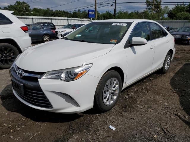 TOYOTA CAMRY LE 2016 with VIN 4T4BF1FK4GR520809 - Photo from auction