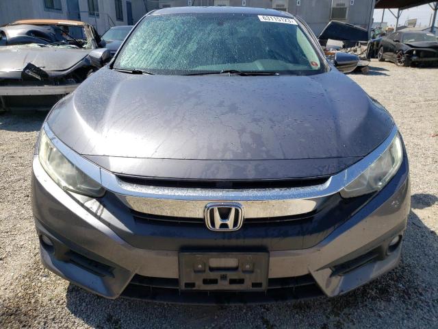 Photo 5 from auction – 2016 HONDA CIVIC EX with VIN 2HGFC1F32GH635284