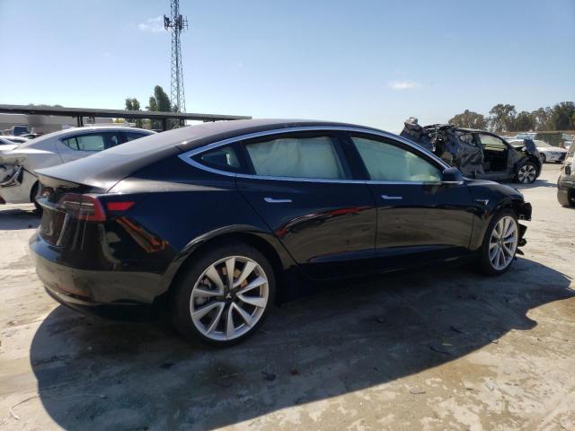 Снимка 3 от търг – 2018 TESLA MODEL 3 с VIN 5YJ3E1EA7JF009383