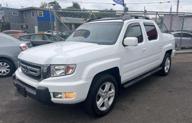 Photo 2 from auction – 2010 HONDA RIDGELINE with VIN 5FPYK1F54AB008232