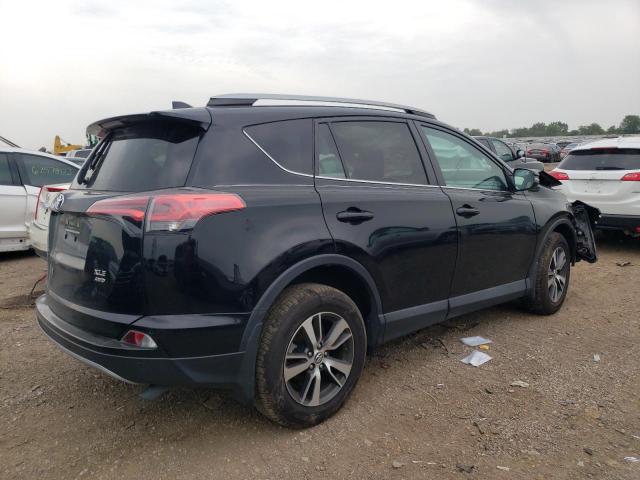 Photo 3 from auction – 2018 TOYOTA RAV4 ADVEN with VIN 2T3RFREV1JW744685