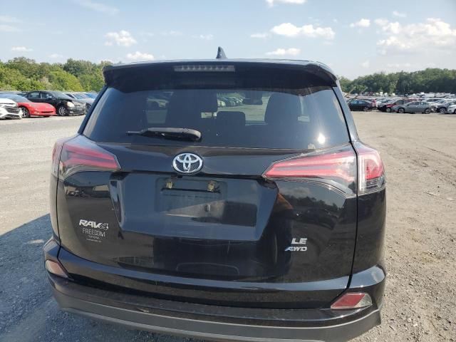 Photo 6 from auction – 2018 TOYOTA RAV4 LE with VIN 2T3BFREV9JW716294
