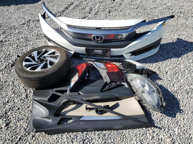 Photo 12 from auction – 2018 HONDA CIVIC LX with VIN 2HGFC4B01JH305091
