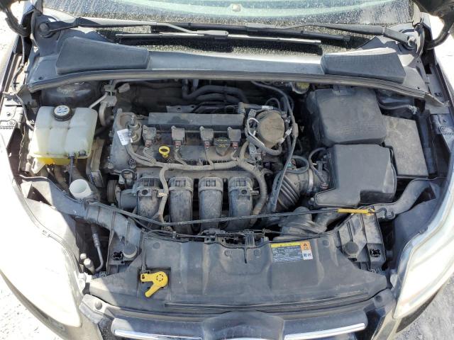Photo 11 from auction – 2013 FORD FOCUS SE with VIN 1FADP3F27DL117687