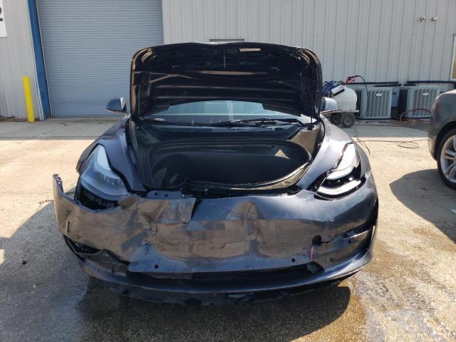 Снимка 5 от търг – 2022 TESLA MODEL 3 с VIN 5YJ3E1EA4NF289222
