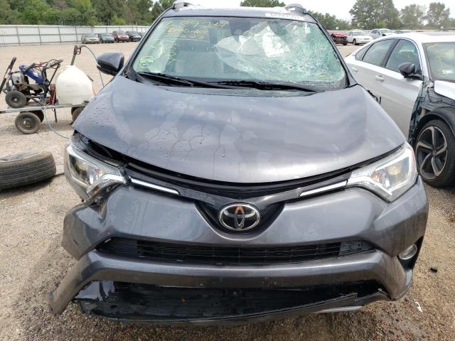 Photo 5 from auction – 2017 TOYOTA RAV4 XLE with VIN JTMRFREV2HD204107