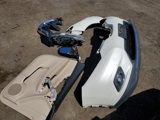 Photo 12 from auction – 2015 NISSAN ROGUE S with VIN 5N1AT2MVXFC838293