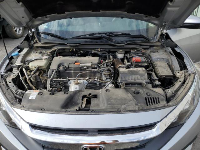 Photo 11 from auction – 2018 HONDA CIVIC LX with VIN 19XFC2F59JE043003