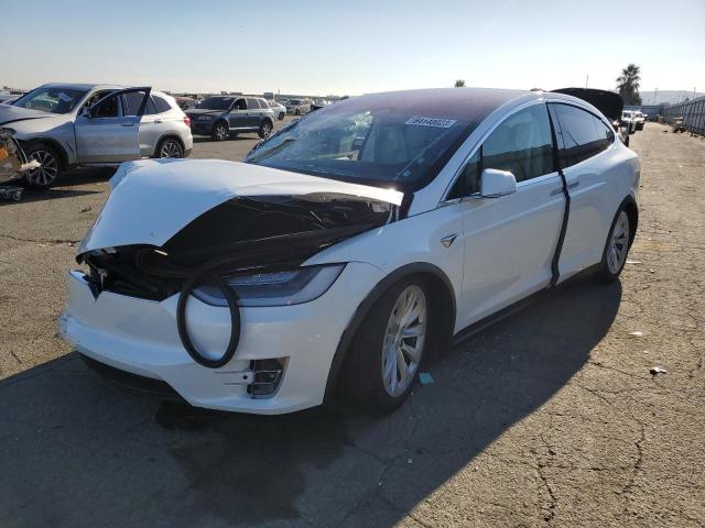 TESLA MODEL X 2018 with VIN 5YJXCBE29JF124475 - Photo from auction
