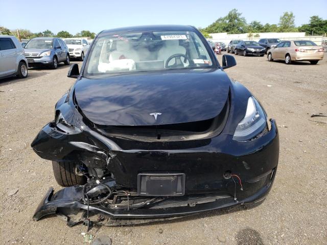 Photo 5 from auction – 2022 TESLA MODEL Y with VIN 7SAYGDEEXNF423707