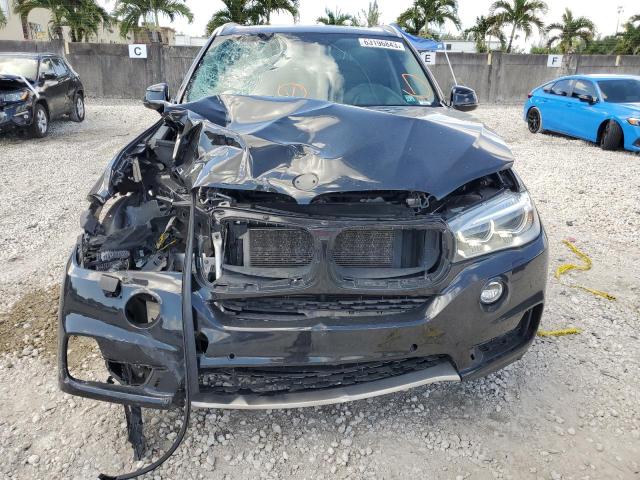 Photo 5 from auction – 2014 BMW X5 XDRIVE5 with VIN 5UXKR6C5XE0C03978