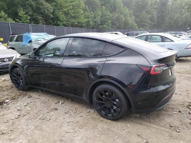 Photo 2 from auction – 2021 TESLA MODEL Y with VIN 5YJYGDEE0MF104070