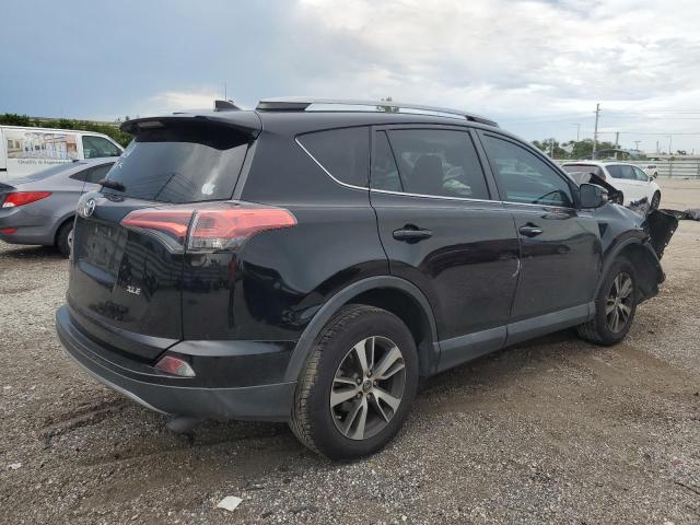 Photo 3 from auction – 2017 TOYOTA RAV4 XLE with VIN 2T3WFREV1HW376974