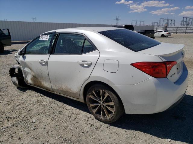 Photo 2 from auction – 2018 TOYOTA COROLLA L with VIN 5YFBURHE6JP842124