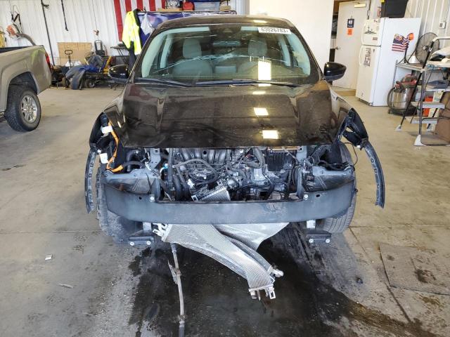 Photo 5 from auction – 2021 FORD ESCAPE SE with VIN 1FMCU9BZ1MUA58498