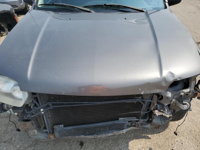 Photo 11 from auction – 2005 FORD ESCAPE LIM with VIN 1FMYU04135KC29354